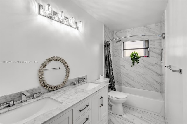 full bathroom featuring toilet, marble finish floor, shower / tub combo with curtain, and a sink