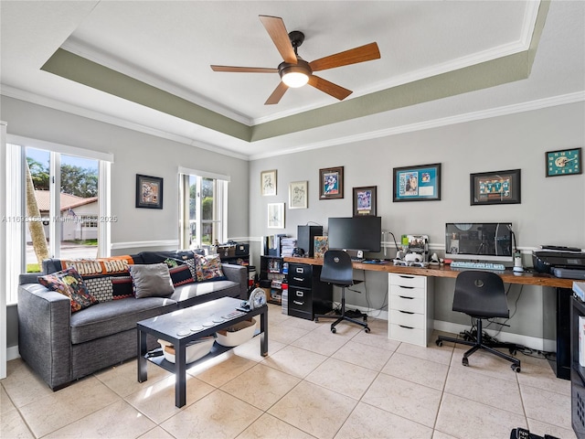 tiled office with a tray ceiling, ceiling fan, and ornamental molding