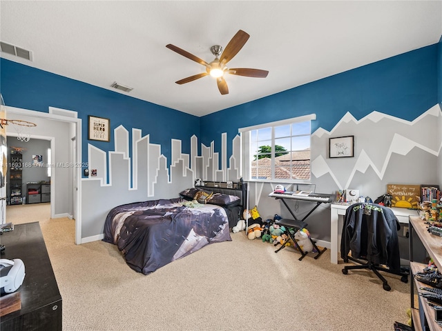 bedroom featuring ceiling fan and light colored carpet