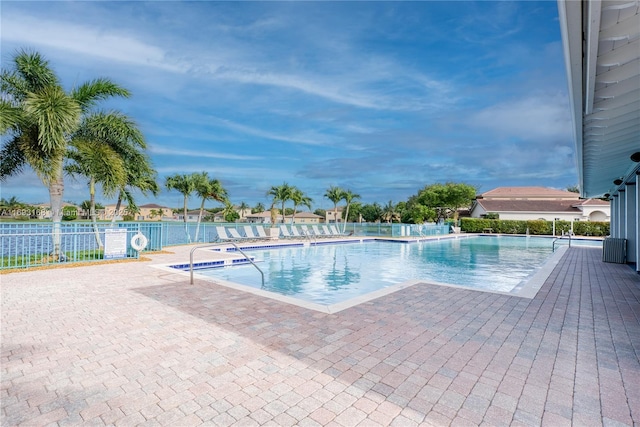 view of swimming pool featuring a patio area