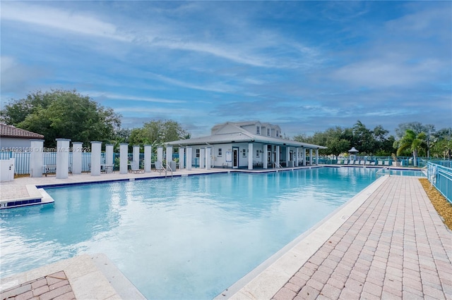 view of pool featuring a patio