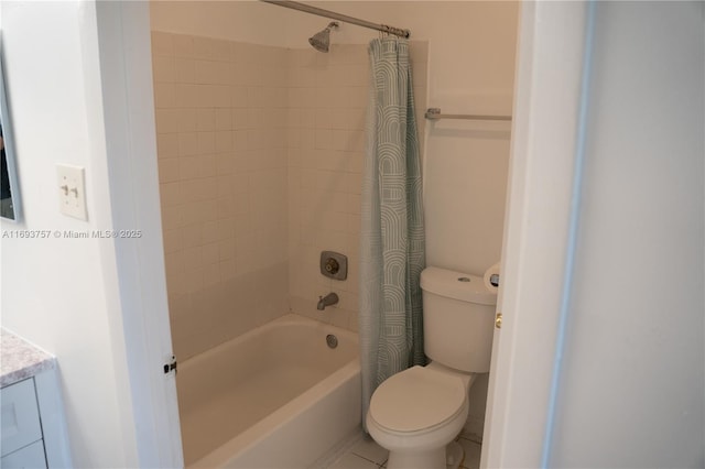 bathroom featuring shower / tub combo with curtain, vanity, and toilet