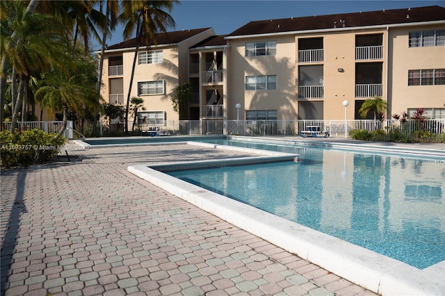 pool featuring fence