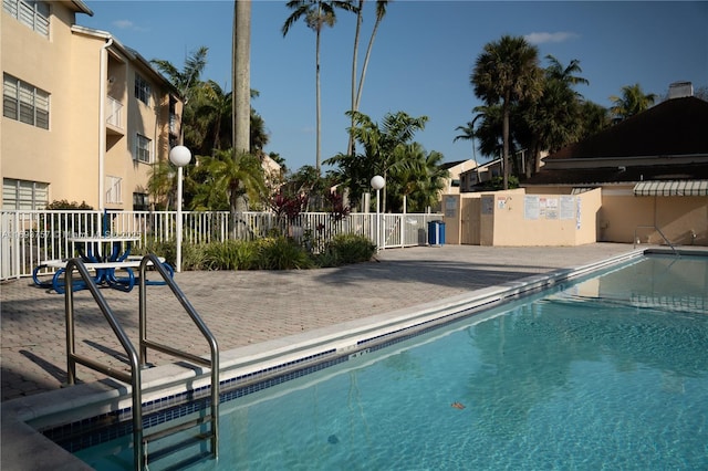 community pool with fence