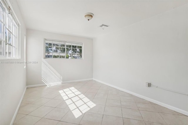 view of tiled spare room