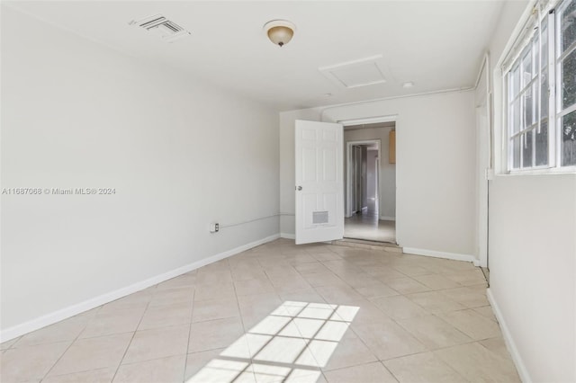 view of tiled spare room