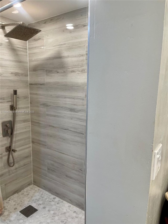 full bath featuring a stall shower