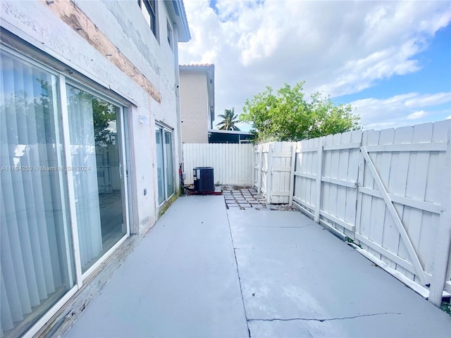 view of patio with central AC