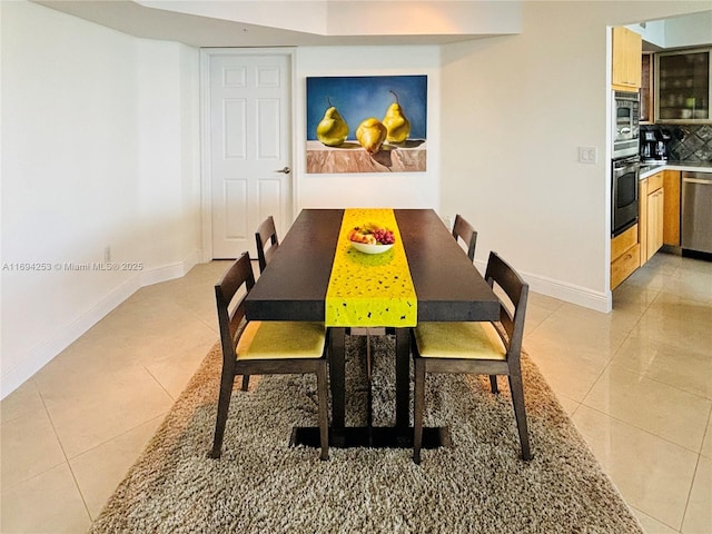 dining room with light tile patterned floors