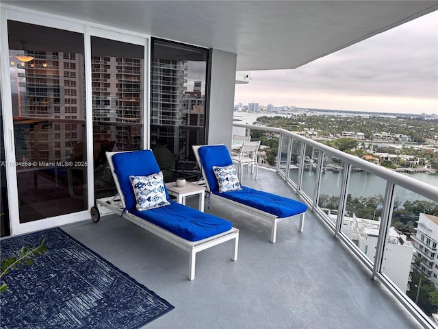 balcony at dusk with a water view