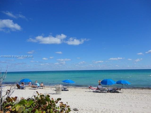 property view of water featuring a view of the beach