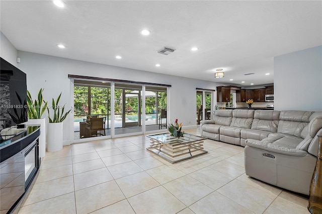 living room with light tile patterned floors