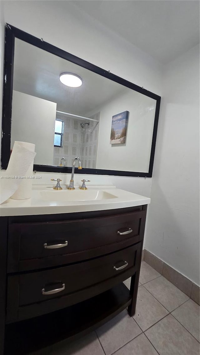 bathroom featuring tile patterned floors and vanity