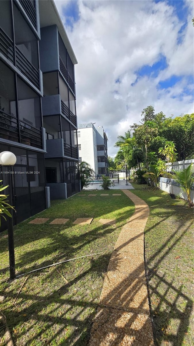 view of community featuring a lawn