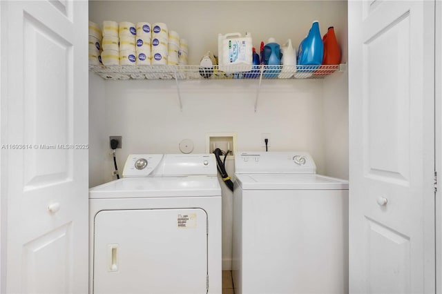 laundry area with washer and dryer