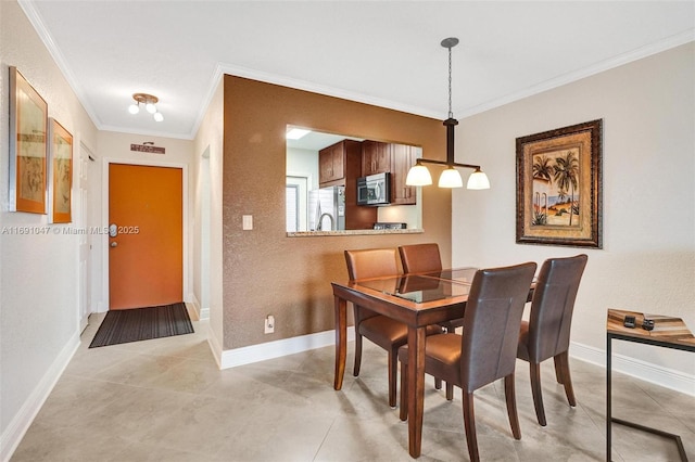 tiled dining area with crown molding