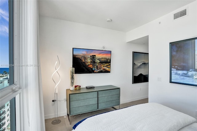 bedroom featuring tile patterned floors