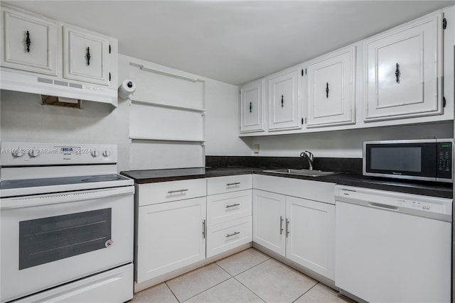 2000 Atlantic Shores Blvd Unit 107, Hallandale Beach, FL 33009 - kitchen with white appliances, a sink, under cabinet range hood, light tile patterned flooring, and white cabinets