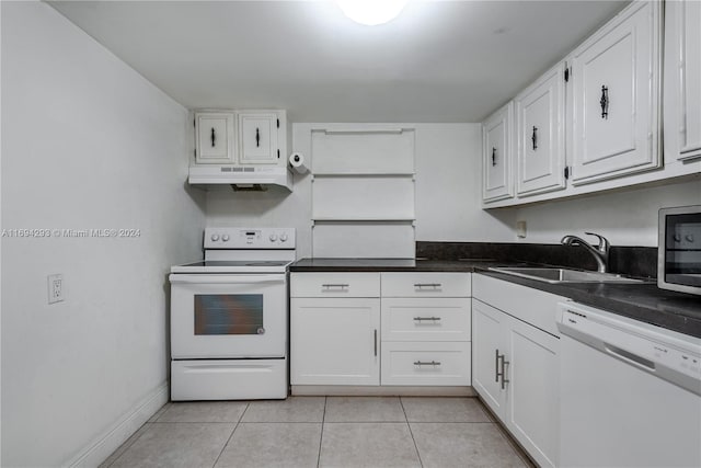 2000 Atlantic Shores Blvd Unit 107, Hallandale Beach, FL 33009 - kitchen with white appliances, a sink, under cabinet range hood, white cabinetry, and light tile patterned floors