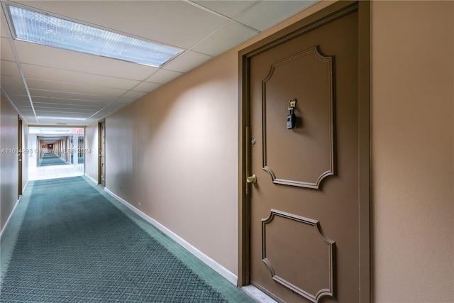 2000 Atlantic Shores Blvd Unit 107, Hallandale Beach, FL 33009 - hallway with carpet flooring and baseboards