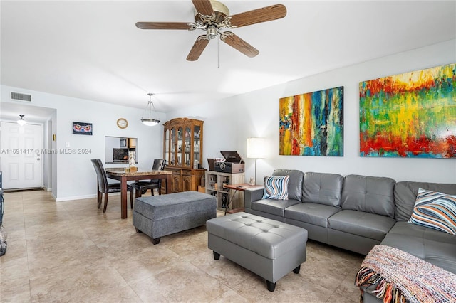 living room featuring ceiling fan