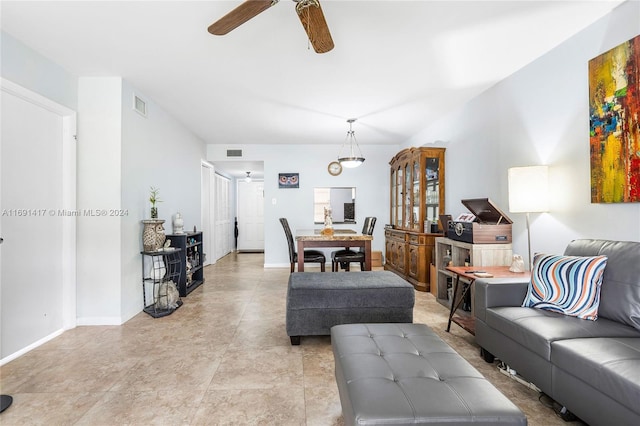 living room with ceiling fan