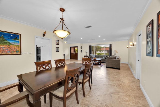 dining room with ornamental molding