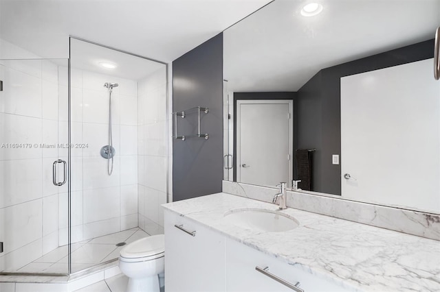 bathroom with walk in shower, tile patterned flooring, vanity, and toilet