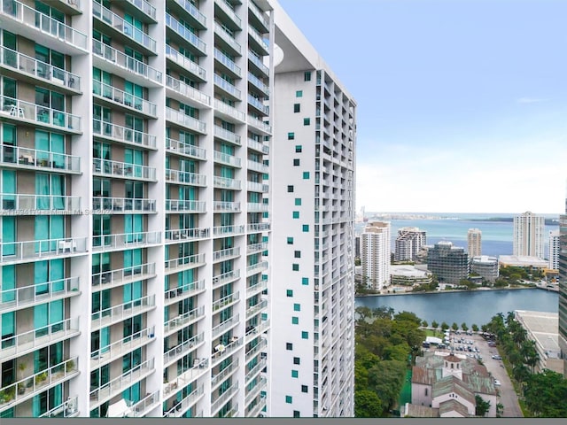 view of building exterior featuring a water view