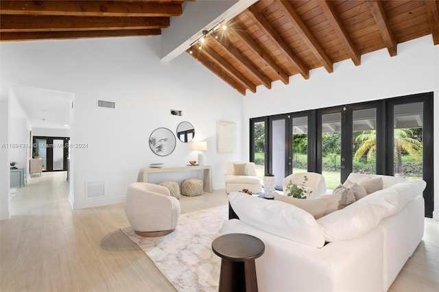 living room with beam ceiling, french doors, high vaulted ceiling, wood ceiling, and light wood-type flooring