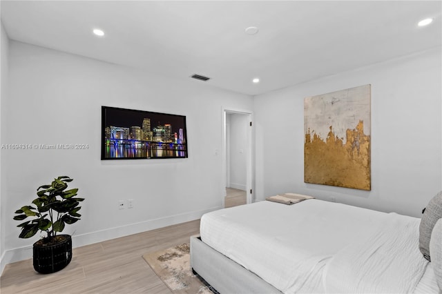 bedroom featuring light wood-type flooring