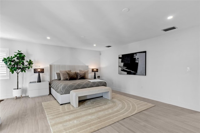 bedroom featuring light hardwood / wood-style flooring