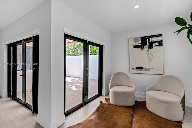 living area featuring light hardwood / wood-style floors