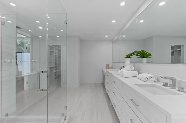 bathroom featuring vanity and walk in shower