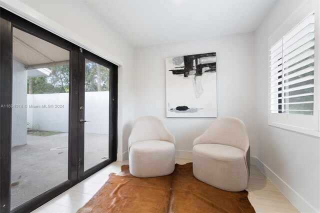 sitting room featuring french doors