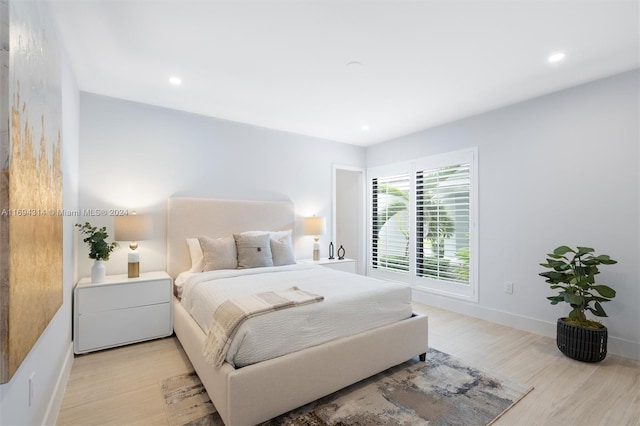 bedroom featuring light hardwood / wood-style flooring