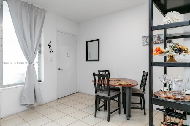 view of tiled dining space