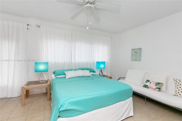 bedroom featuring ceiling fan and light tile patterned floors