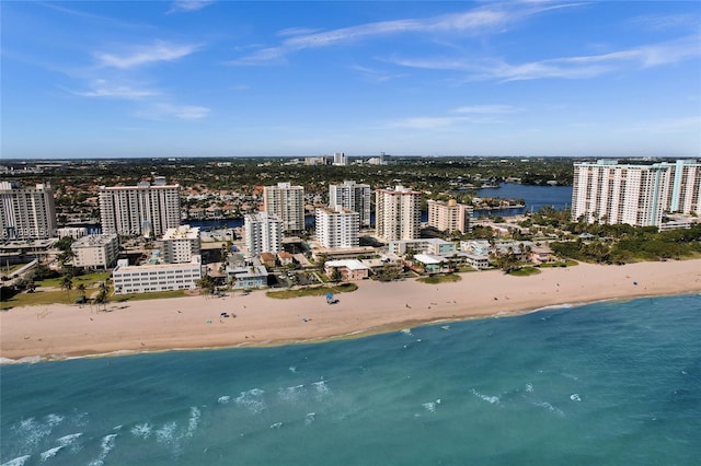 aerial view with a view of the beach and a water view