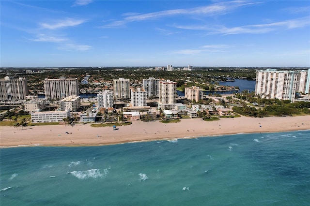 drone / aerial view with a view of the beach and a water view