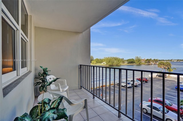 balcony featuring a water view