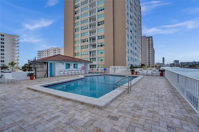 view of swimming pool with a patio area