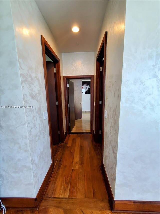 hall featuring dark hardwood / wood-style floors