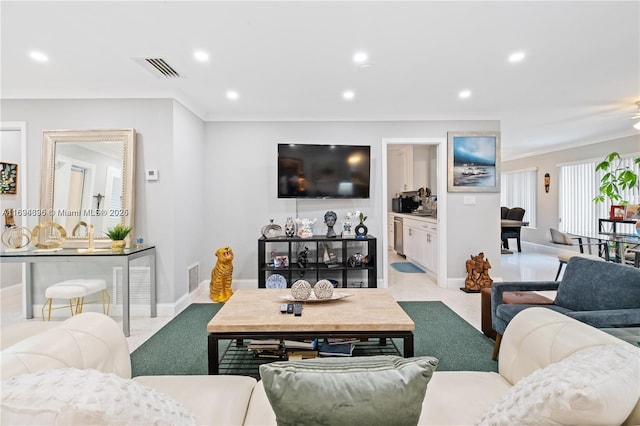 living room with crown molding