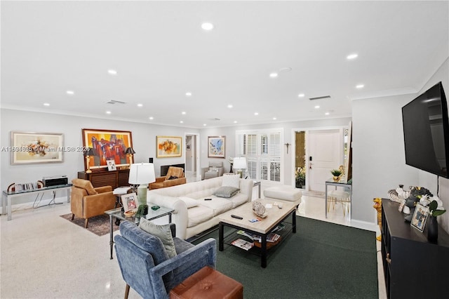 living room with ornamental molding