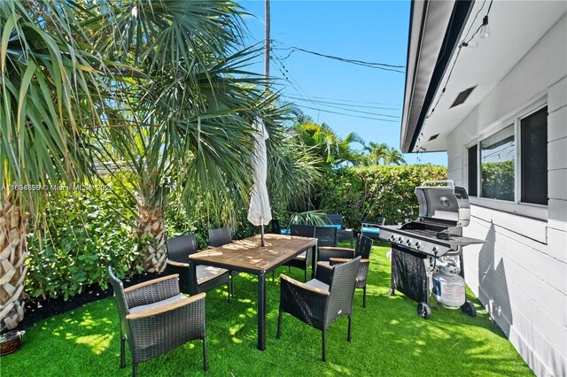 view of patio / terrace featuring a grill