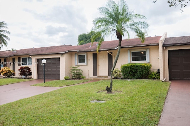 7708 Margate Blvd Unit C3-4, Margate, FL 33063 - ranch-style house with a garage, driveway, stucco siding, and a front yard