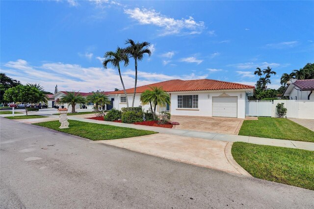 8925 SW 11th St, Miami, FL 33174 - view of front of house with concrete driveway, an attached garage, stucco siding, and a tiled roof