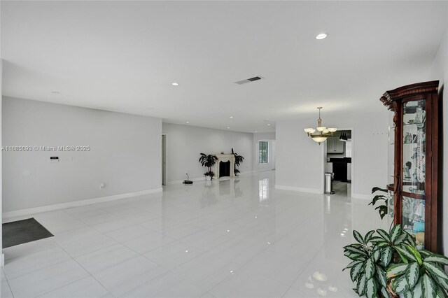 8925 SW 11th St, Miami, FL 33174 - unfurnished living room with light tile patterned floors, a chandelier, baseboards, and recessed lighting
