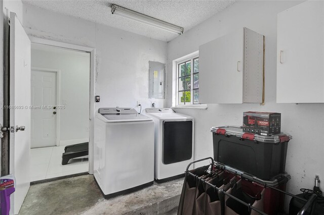8925 SW 11th St, Miami, FL 33174 - washroom with washer and dryer, electric panel, and a textured ceiling